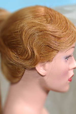 Vorderkopf-Wellen in den Ponytail führen